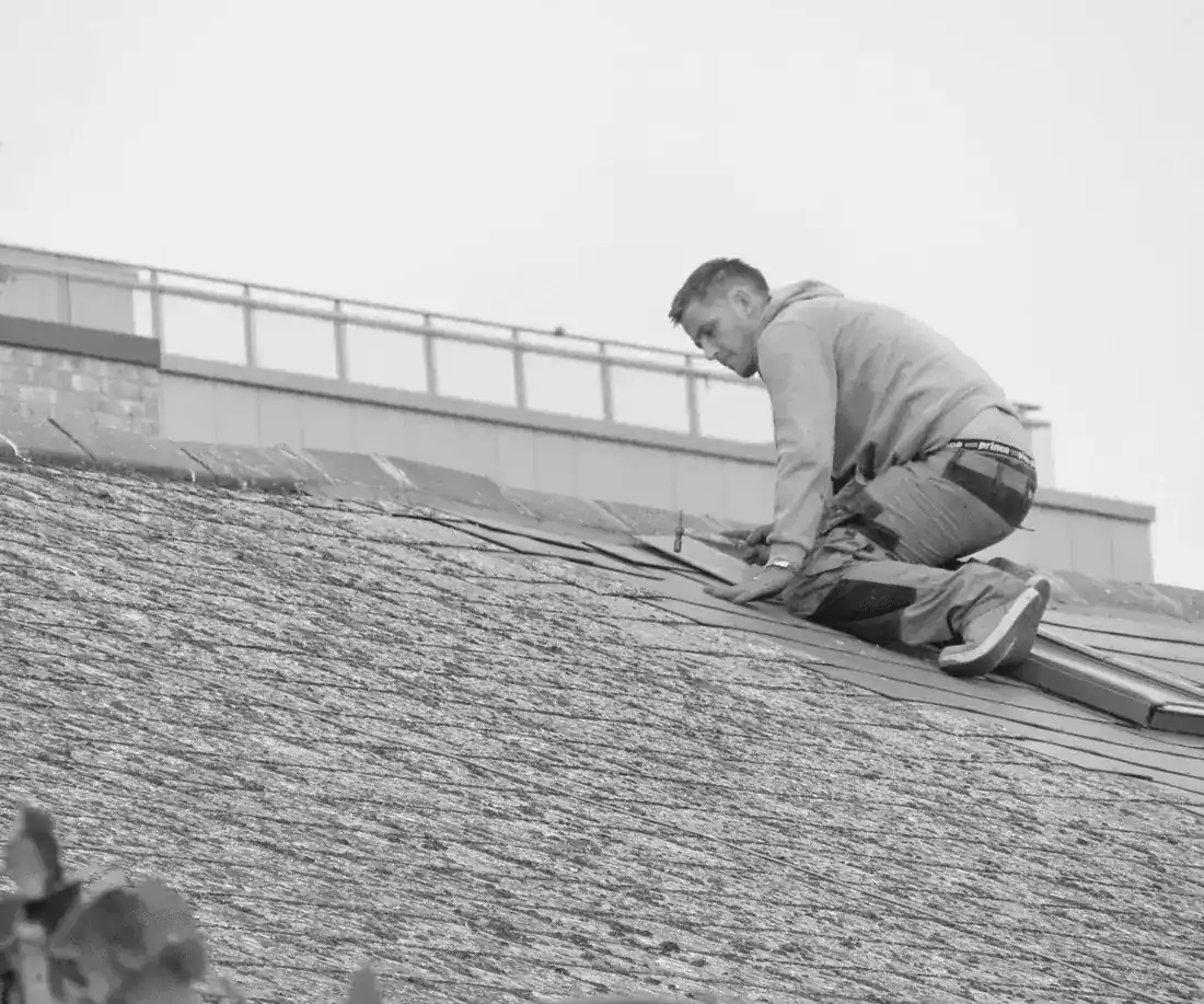 Tradesperson working on a roof