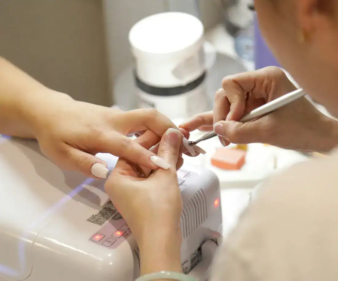 Nail technician at work